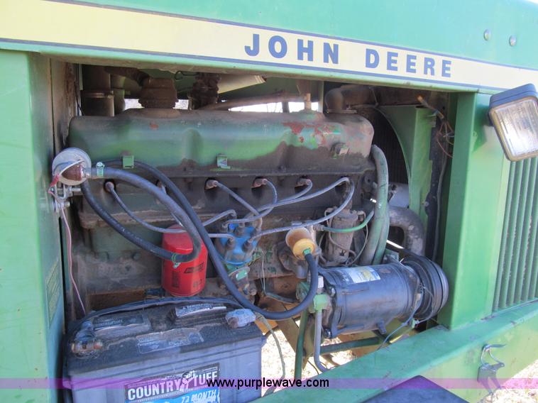 image for item G9722 1982 John Deere 2420 self-propelled swather