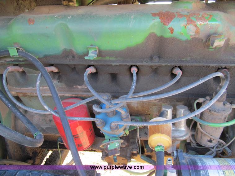 image for item G9722 1982 John Deere 2420 self-propelled swather