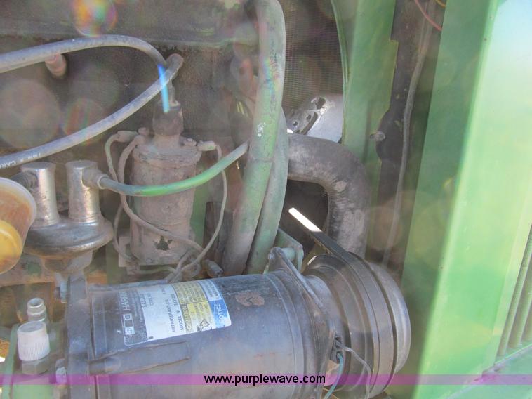 image for item G9722 1982 John Deere 2420 self-propelled swather