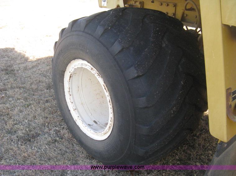 image for item H4377 1998 Ag-Chem TerraGator 1844 dry spreader truck