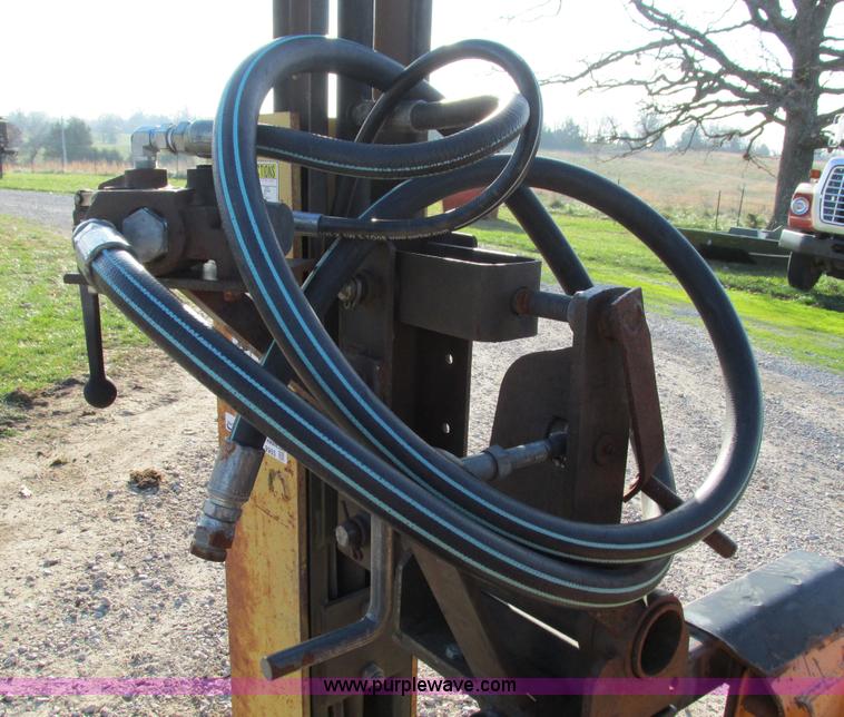 image for item AC9965 Farm Star hydrualic post driver skid steer attachment