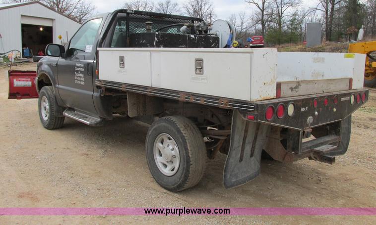 image for item F5454 2002 Ford F350 Super Duty XL flatbed truck