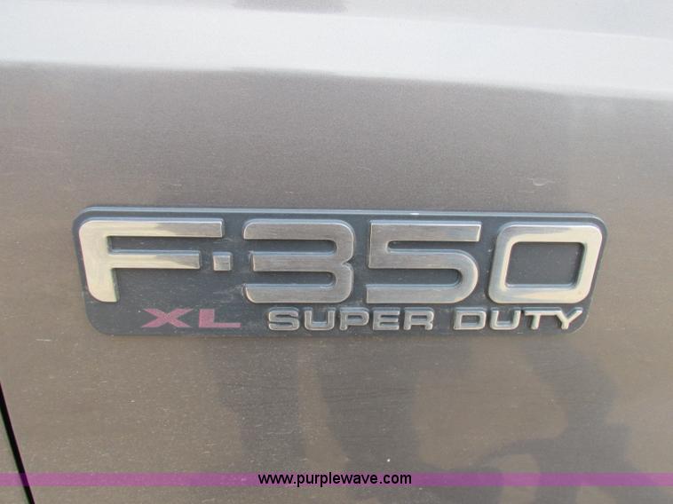 image for item F5454 2002 Ford F350 Super Duty XL flatbed truck