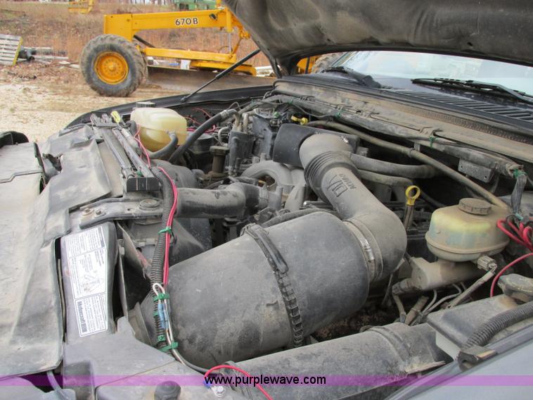 image for item F5454 2002 Ford F350 Super Duty XL flatbed truck