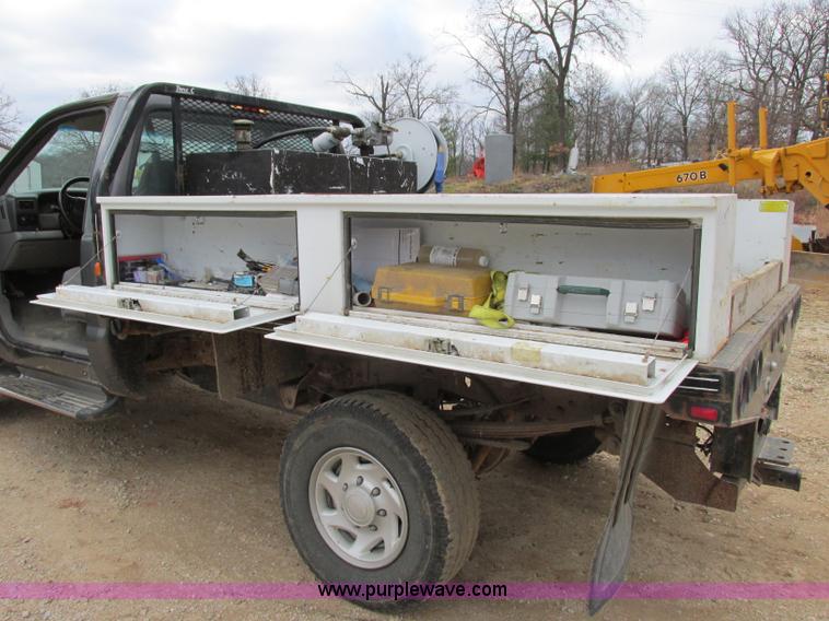 image for item F5454 2002 Ford F350 Super Duty XL flatbed truck