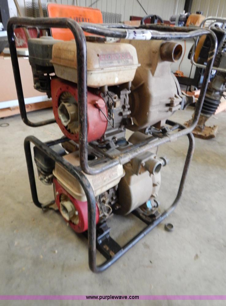 image for item H3929 (2) Honda WT20X trash pumps