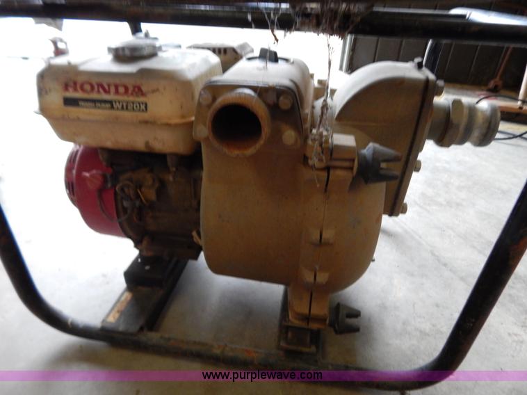 image for item H3934 (2) Honda WT20X trash pumps