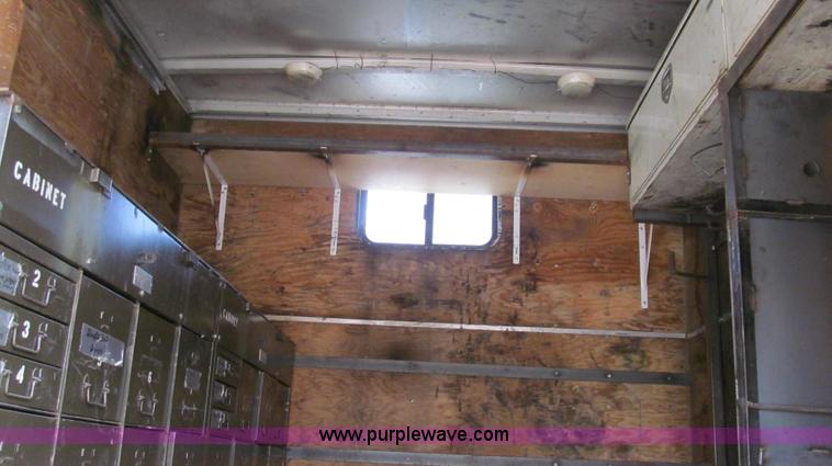 image for item G2180 2002 International 4900 bridge maintenance truck