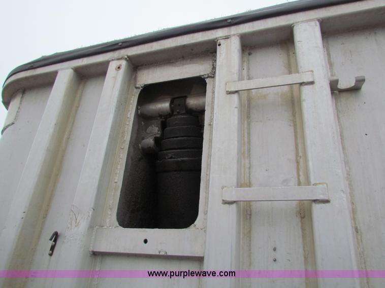 image for item G4376 1980 shop built 28' aluminum barrel end dump trailer