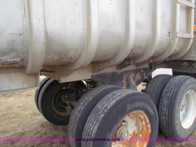 image for item G4376 1980 shop built 28' aluminum barrel end dump trailer