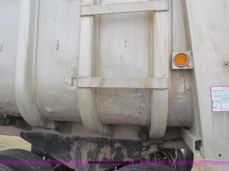 image for item G4376 1980 shop built 28' aluminum barrel end dump trailer