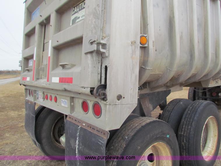 image for item G4376 1980 shop built 28' aluminum barrel end dump trailer