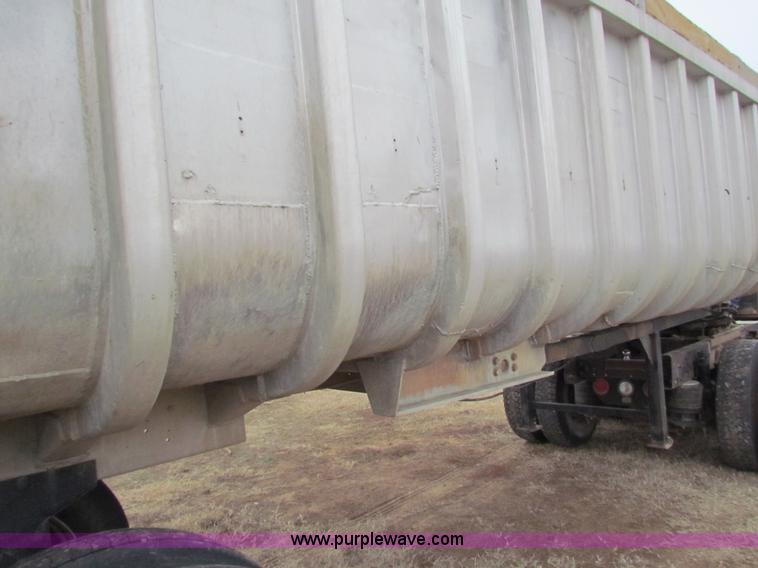 image for item G4376 1980 shop built 28' aluminum barrel end dump trailer