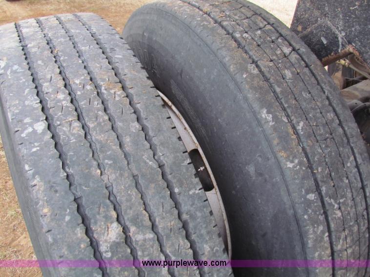 image for item G4376 1980 shop built 28' aluminum barrel end dump trailer