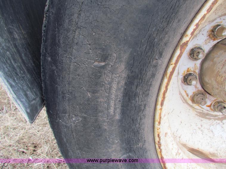 image for item G4376 1980 shop built 28' aluminum barrel end dump trailer