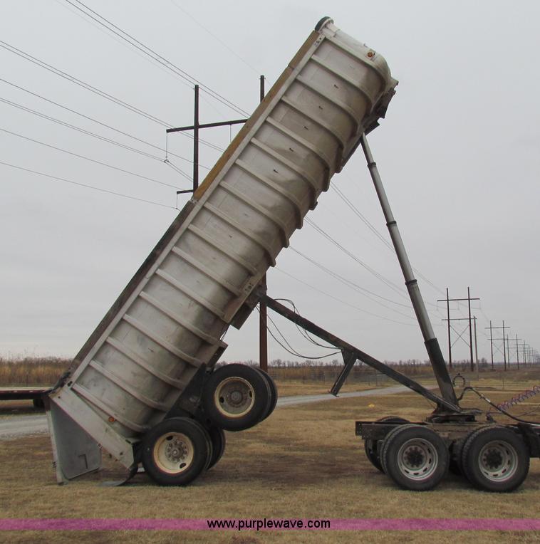 image for item G4376 1980 shop built 28' aluminum barrel end dump trailer