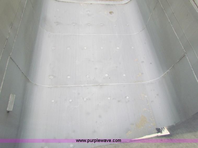 image for item G4376 1980 shop built 28' aluminum barrel end dump trailer