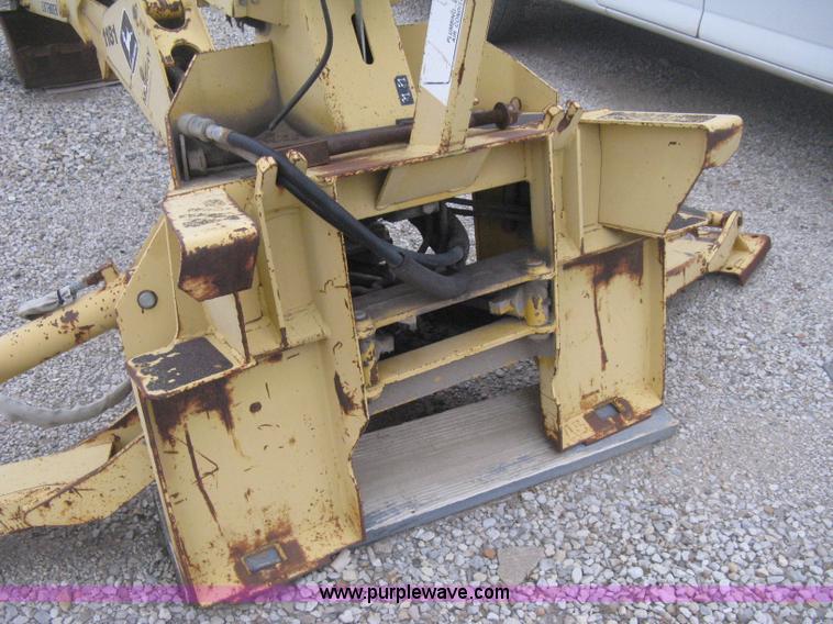 image for item H4343 John Deere Pro 911 Extender skid steer backhoe attachment