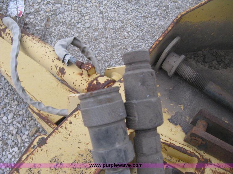 image for item H4343 John Deere Pro 911 Extender skid steer backhoe attachment