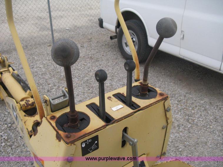 image for item H4343 John Deere Pro 911 Extender skid steer backhoe attachment