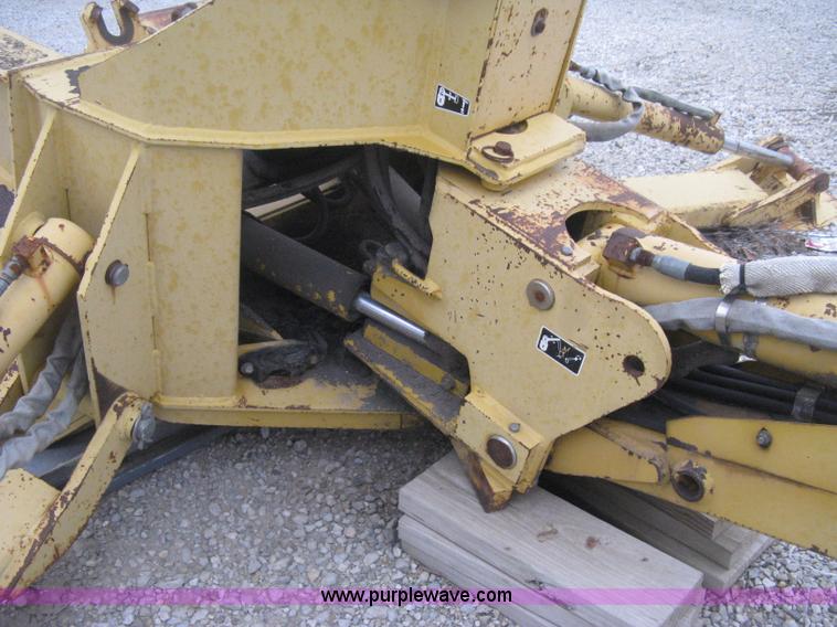 image for item H4343 John Deere Pro 911 Extender skid steer backhoe attachment