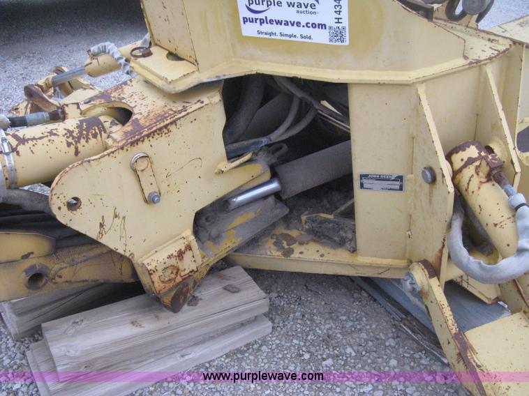 image for item H4343 John Deere Pro 911 Extender skid steer backhoe attachment