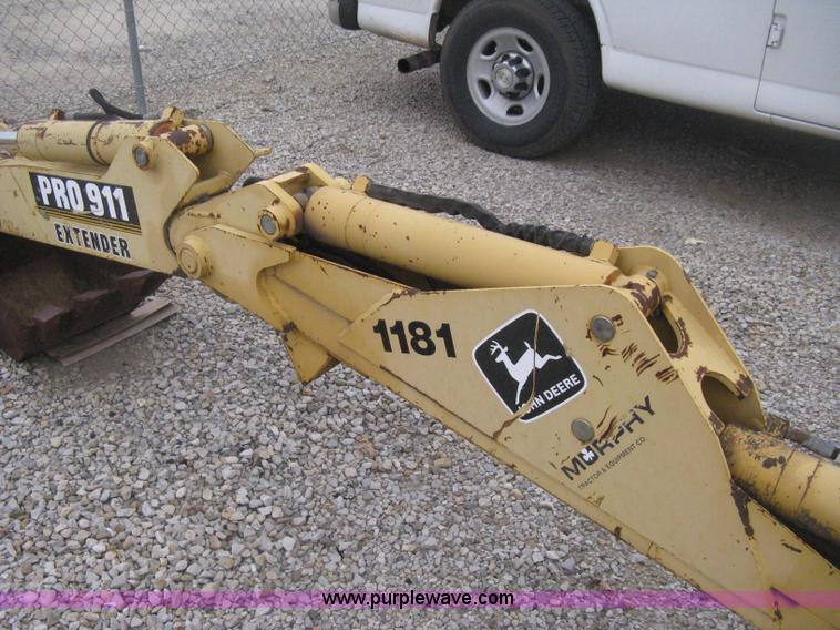 image for item H4343 John Deere Pro 911 Extender skid steer backhoe attachment