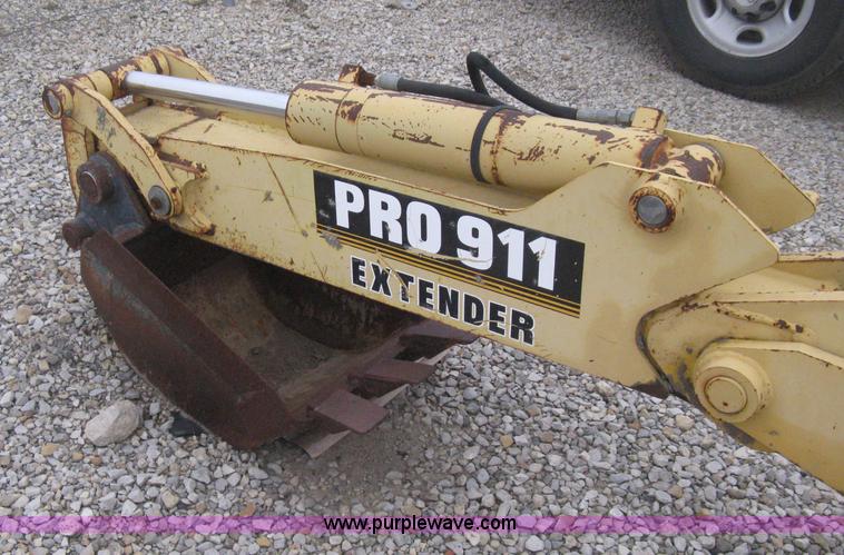 image for item H4343 John Deere Pro 911 Extender skid steer backhoe attachment