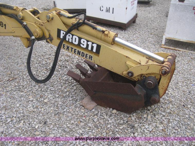 image for item H4343 John Deere Pro 911 Extender skid steer backhoe attachment