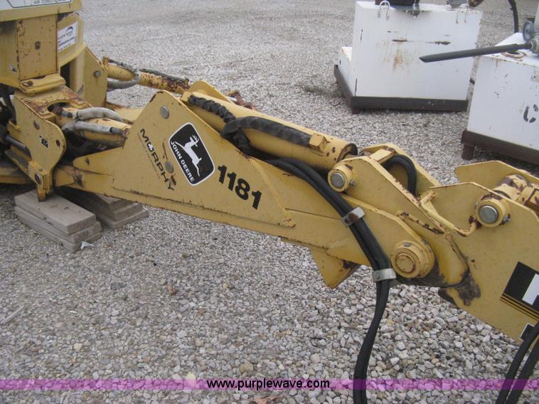 image for item H4343 John Deere Pro 911 Extender skid steer backhoe attachment