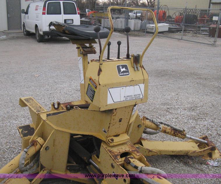 image for item H4343 John Deere Pro 911 Extender skid steer backhoe attachment