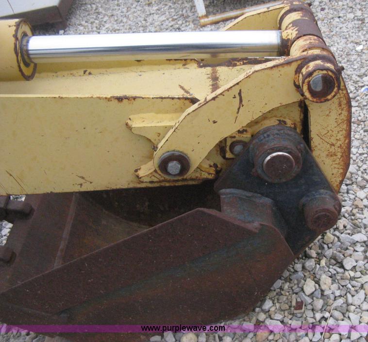 image for item H4343 John Deere Pro 911 Extender skid steer backhoe attachment