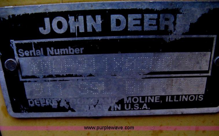 image for item H4343 John Deere Pro 911 Extender skid steer backhoe attachment