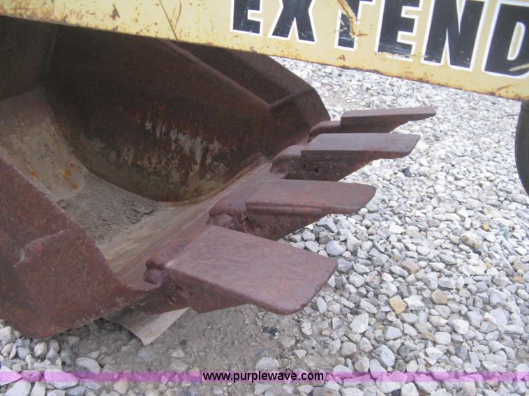 image for item H4343 John Deere Pro 911 Extender skid steer backhoe attachment