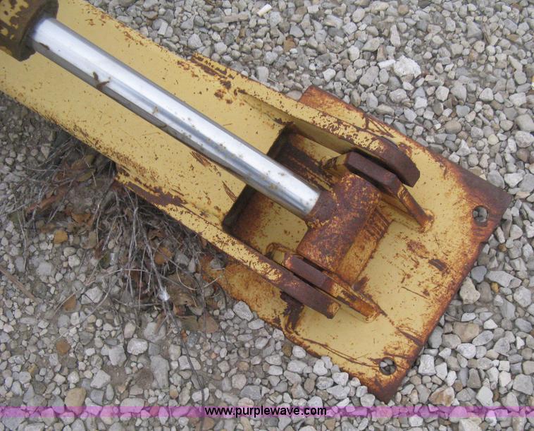 image for item H4343 John Deere Pro 911 Extender skid steer backhoe attachment