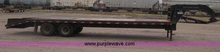 image for item H4401 2000 L&L gooseneck flatbed trailer