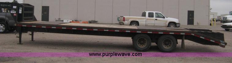 image for item H4401 2000 L&L gooseneck flatbed trailer