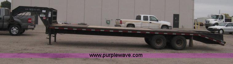 image for item H4401 2000 L&L gooseneck flatbed trailer