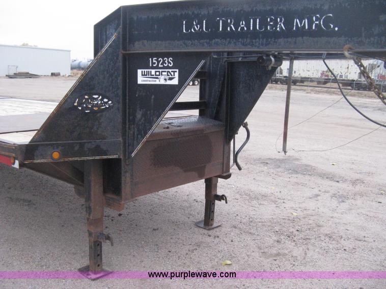 image for item H4401 2000 L&L gooseneck flatbed trailer