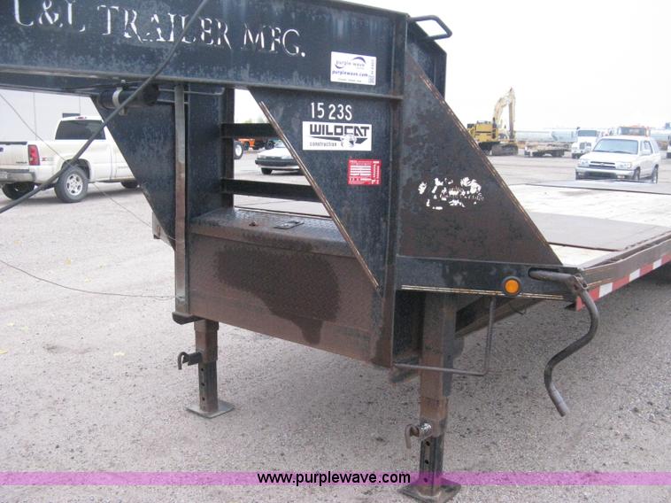 image for item H4401 2000 L&L gooseneck flatbed trailer