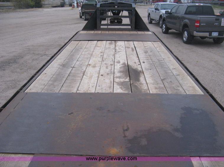 image for item H4401 2000 L&L gooseneck flatbed trailer