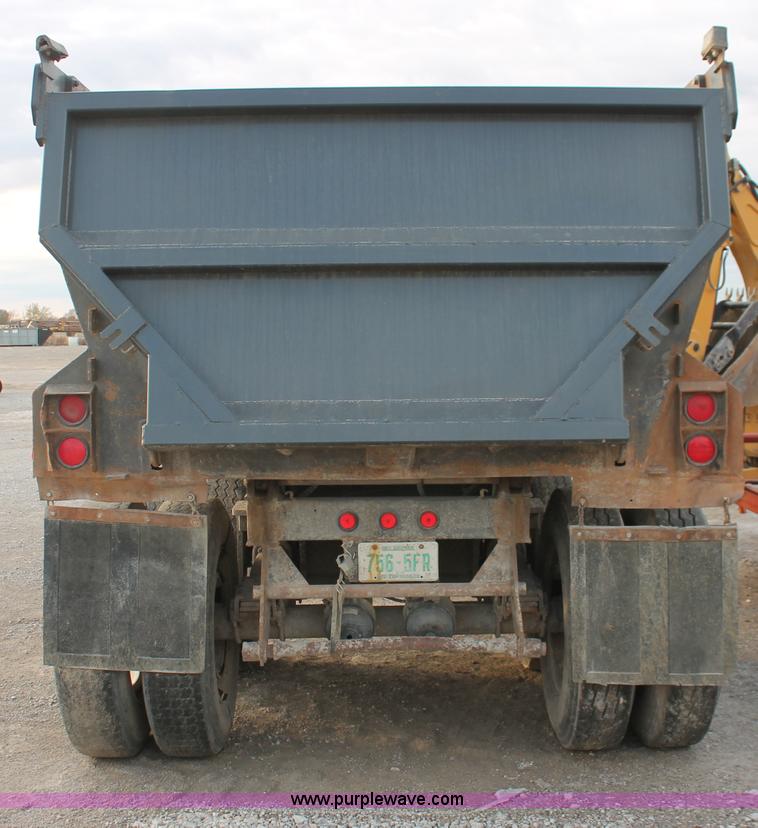 image for item H8416 1998 Travis barrel end dump trailer