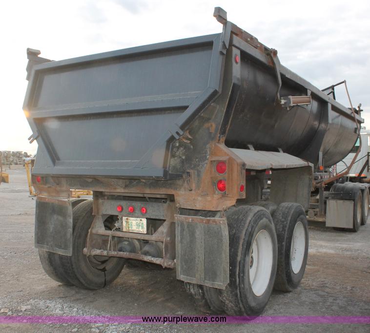 image for item H8416 1998 Travis barrel end dump trailer