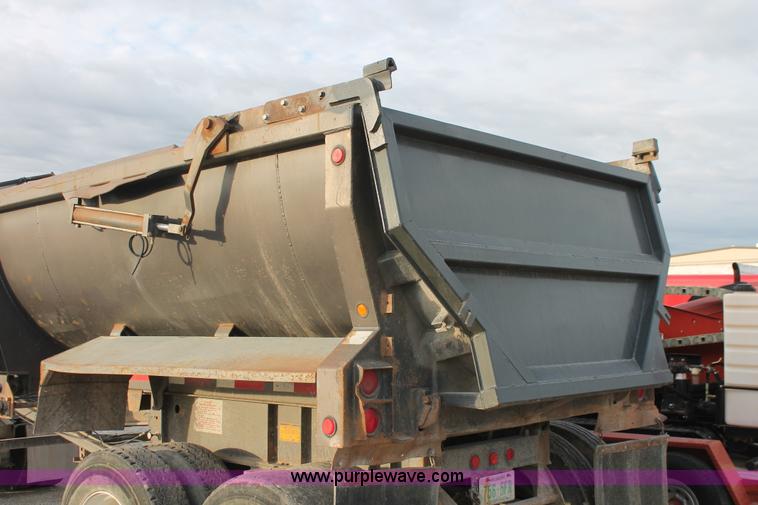 image for item H8416 1998 Travis barrel end dump trailer