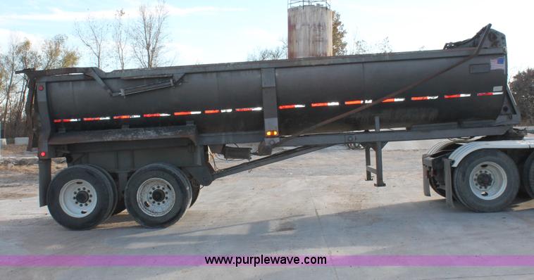 image for item H8418 1998 Travis barrel end dump trailer