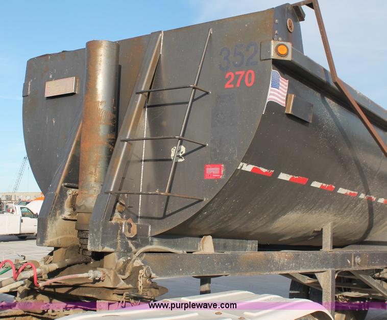 image for item H8418 1998 Travis barrel end dump trailer