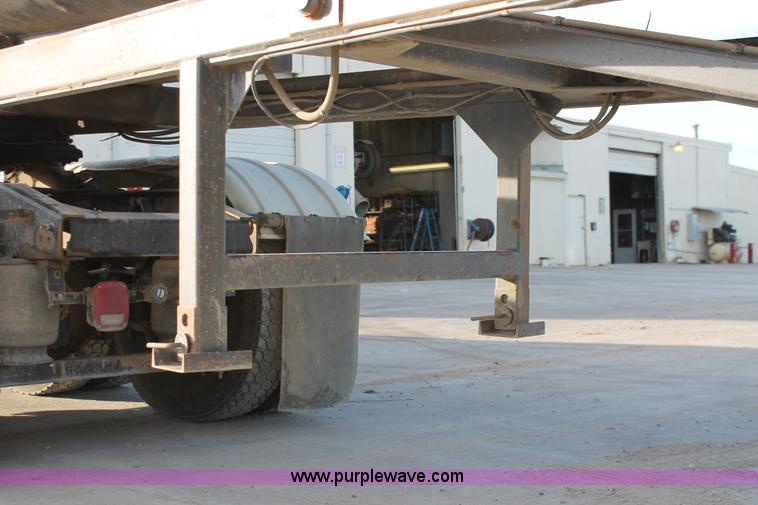 image for item H8418 1998 Travis barrel end dump trailer