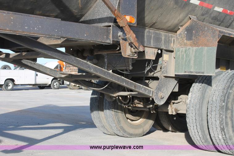 image for item H8418 1998 Travis barrel end dump trailer