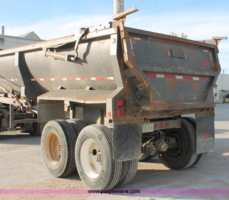 image for item H8418 1998 Travis barrel end dump trailer
