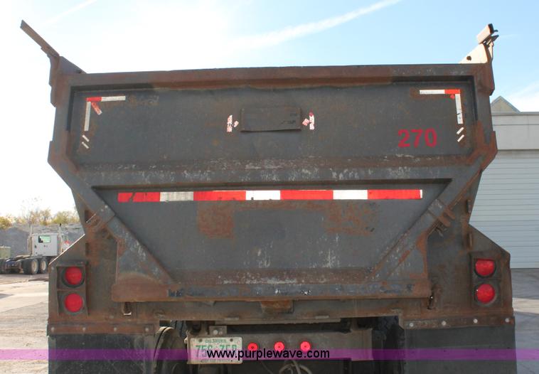 image for item H8418 1998 Travis barrel end dump trailer